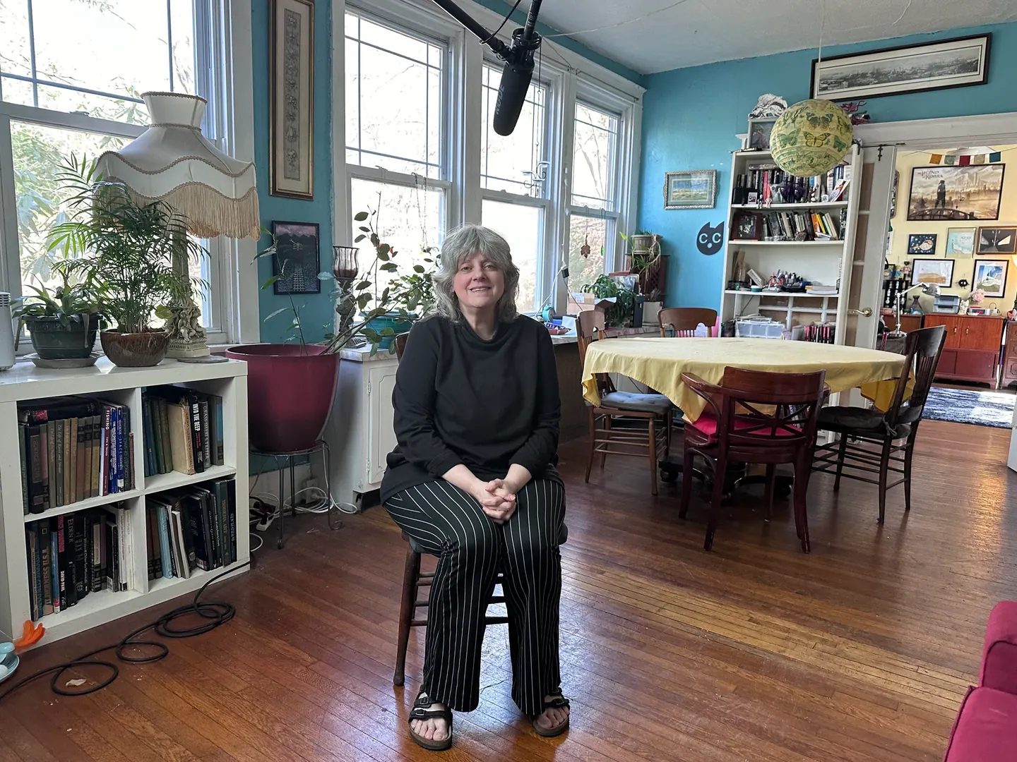 Lila Shaara seated for an interview in a sunlit room.
