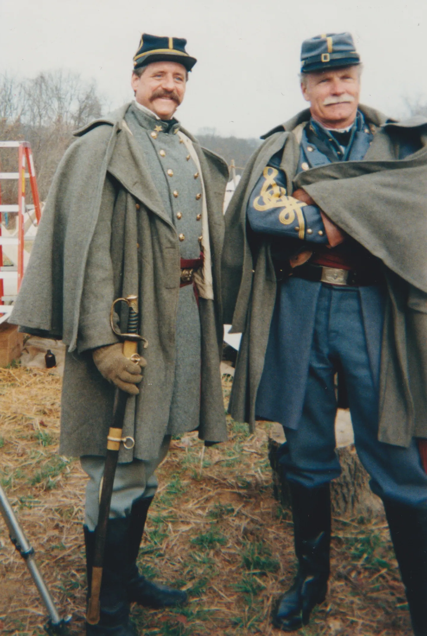 Jeff Shaara and Ted Turner in Civil War officers’ uniforms and greatcoats on the set of Gods and Generals.